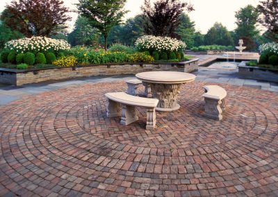virginia-brick-paver-patterns-for-patios-in-herringtone-pattern-and-running-bond-variation-in-circular-edge-and-chairs-at-the-center-plus-gar